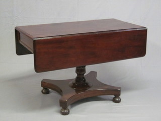 A Victorian mahogany pedestal Pembroke table, raised on a  turned column with triform base 41"