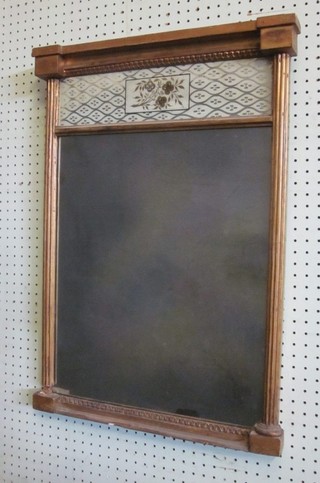 A Regency rectangular plate chimney mirror contained in a gilt frame with reeded columns to the side 19"