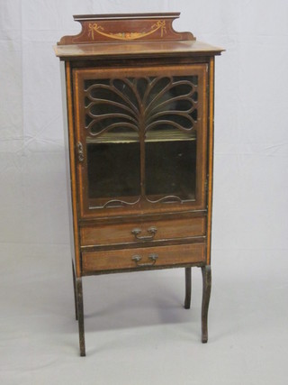 An Edwardian Art Nouveau inlaid mahogany display cabinet,  with raised back, the interior fitted shelves and enclosed by  glazed panelled doors, the base fitted 2 drawers, raised on  cabriole supports 22"