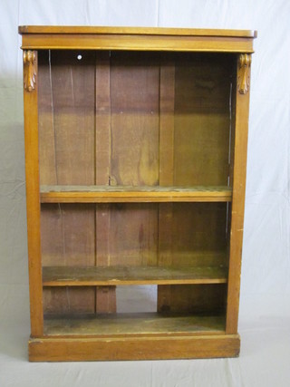 A Victorian honey oak bookcase fitted adjustable shelves 36"