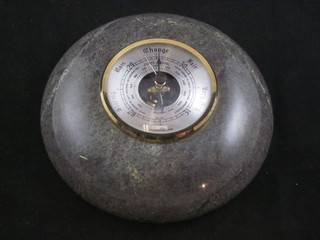An aneroid barometer contained in a serpentine case 6"