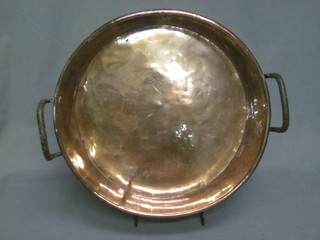 A copper twin handled preserving pan with iron handles 16"