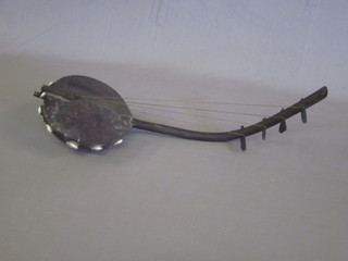 An African Cora Harp 4 stringed banjo