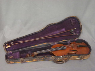 A violin labelled AN Antonius Stradivarius Cremonensis  Faciebat 14" together with 2 bows contained in a fibre carrying  case