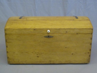 A dome shaped Continental polished pine box with iron hinges  and handles 38"
