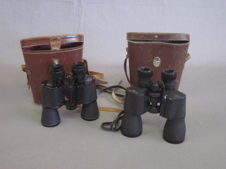 A pair of Monach 10 x 50 binoculars and 1 other pair of 10 x 50 binoculars