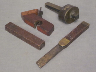 A small shaped wooden plane 5", a brass and wooden mounted  mortice gauge, a spirit level and 1 other gauge