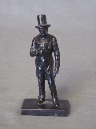 A 19th Century cast iron figure of a standing Policeman 52
