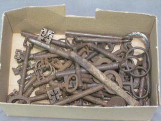 A collection of various antique keys