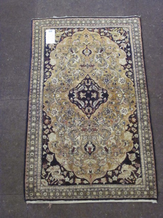 A fine quality black ground Persian carpet with central medallion 42" x 24"