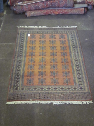 A brown ground Bokhara rug having 32 stylised octagons to the  centre within multi row borders 84" x 59"