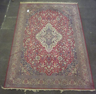 A fine quality contemporary red and blue ground Persian rug with diamond shaped lozenge to the centre 124" x 78"