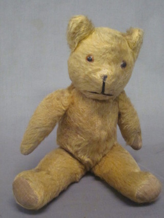 A yellow brown teddybear with articulated body 13"