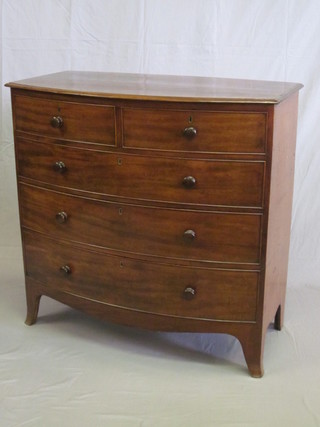 A 19th Century mahogany bow front chest of 2 short and 3 long drawers, raised on splayed bracket feet 42"