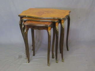 A nest of 3 inlaid and shaped satinwood occasional tables, raised  on cabriole supports 34"