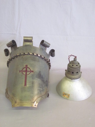 A 1930's polished steel wall light bracket in the form of a knights helmet