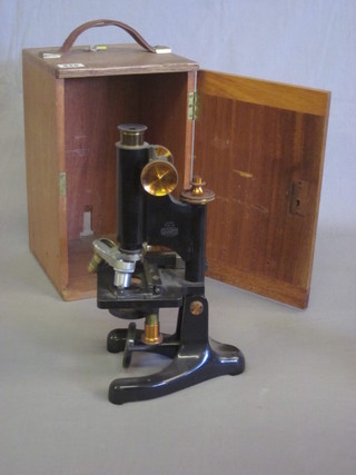 A Beck model 22 single pillar microscope, boxed
