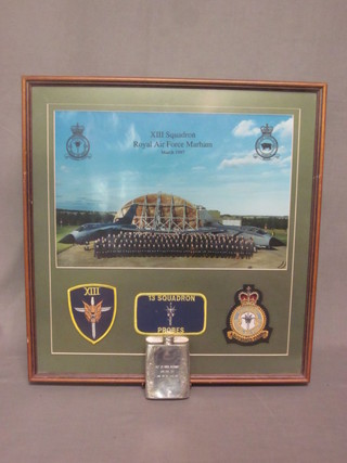 A colour photograph of XII Squadron Royal Air Force Marham  1987, 3 squadron badges and a pewter hip flask