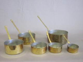 6 brass saucepans