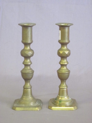A pair of 19th Century brass candlesticks with knopped stems 8"