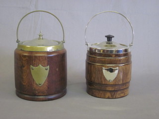 2 turned oak biscuit barrels with plated mounts