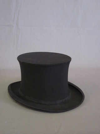 A gentleman's folding opera hat by Harrods