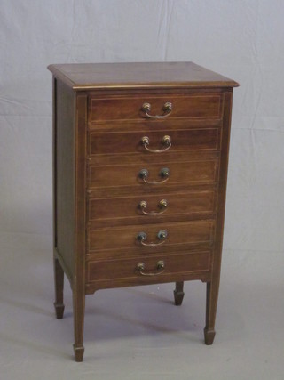 An Edwardian inlaid mahogany music chest of 6 long drawers,  raised on square supports ending in spade feet 20"
