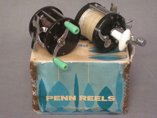 A Penn 77 fishing reel, together with a Temper 981E fishing  reel boxed,