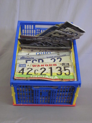 A collection of 100 American pressed metal number plates