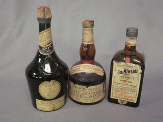 A bottle of Benedictine, a bottle of fine old champagne cognac  and a bottle of Cointreau liqueur