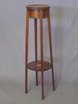 A circular Edwardian inlaid mahogany 2 tier jardiniere stand, raised on square supports 10"