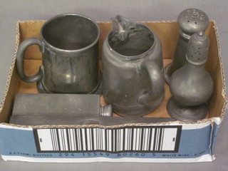 A pewter baluster shaped pepperette, 1 other, a pewter box with  hinged lid, brass cream jug and a tankard