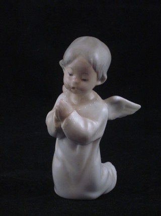 A Lladro figure of a kneeling Angel in prayer 5"   ILLUSTRATED