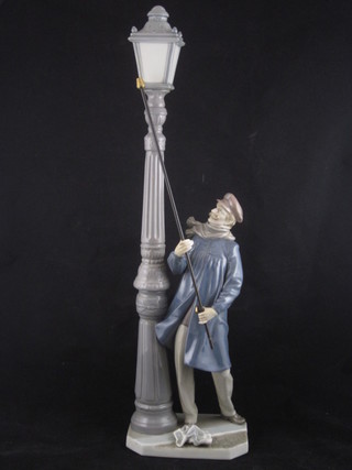A Lladro figure - The Lamp Lighter, base impressed F29MY 18"  ILLUSTRATED