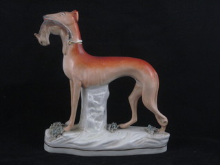 A 19th Century Staffordshire figure of a standing greyhound with  hare 8"  ILLUSTRATED