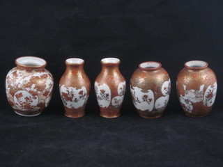2 pairs of Japanese Kutana vases with floral decoration the base with signature marks 3" and a globular vase with 3 character  mark to the base 3"