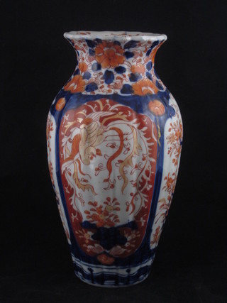 A 19th Century Japanese Imari porcelain vase with ribbed body decorated birds 10"
