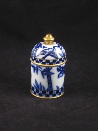 A 19th Century cylindrical blue and white match striker and cover with gilt banding, slight chip to inner rim, 3"
