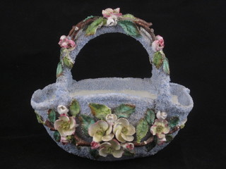 A Victorian porcelain basket shaped vase with floral encrusted decoration 6"