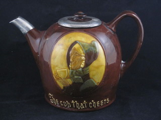 A Royal Doulton teapot with silver mounts marked The Cup That Cheers 6"