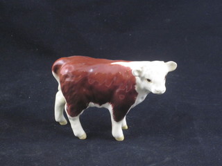 A Beswick figure of a standing Herefordshire Bullock 2 1/2"