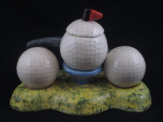 A Shorter & Sons novelty golf cruet in the form of 3 golf balls  6", crack to base,