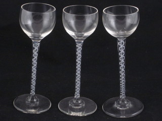 A set of 3 long stemmed liqueur glasses with cotton twist stems  5"