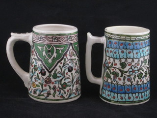 2 Persian style pottery tankards 5"