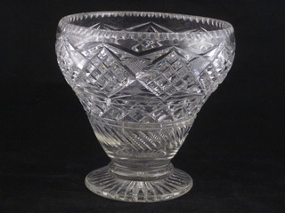 A circular waisted cut glass vase 7"