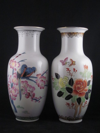 A pair of Oriental style club shaped porcelain vases with floral decoration 12"