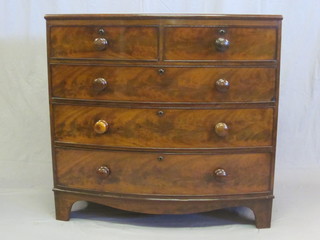 A 19th Century mahogany bow front chest of 2 short and 2 long drawers with tore handles, raised on bracket feet 41"
