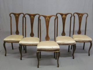 A set of 5 Edwardian inlaid mahogany Art Nouveau slat back dining chairs, raised on cabriole supports