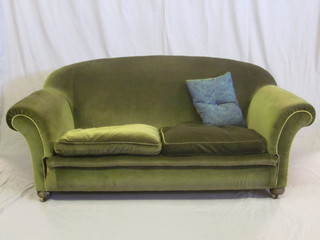 A 1930's Chesterfield style 2 seat settee upholstered in green Dralon 71"