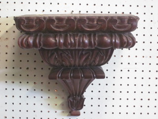 A Victorian square mahogany bracket, carved acanthus leaves  10"